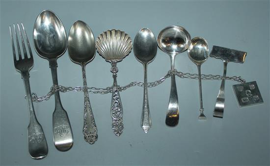 A group of silver cutlery